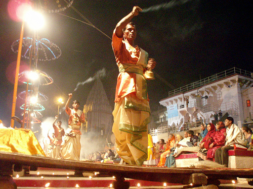 Priests offering puja (worship) to the Ganges